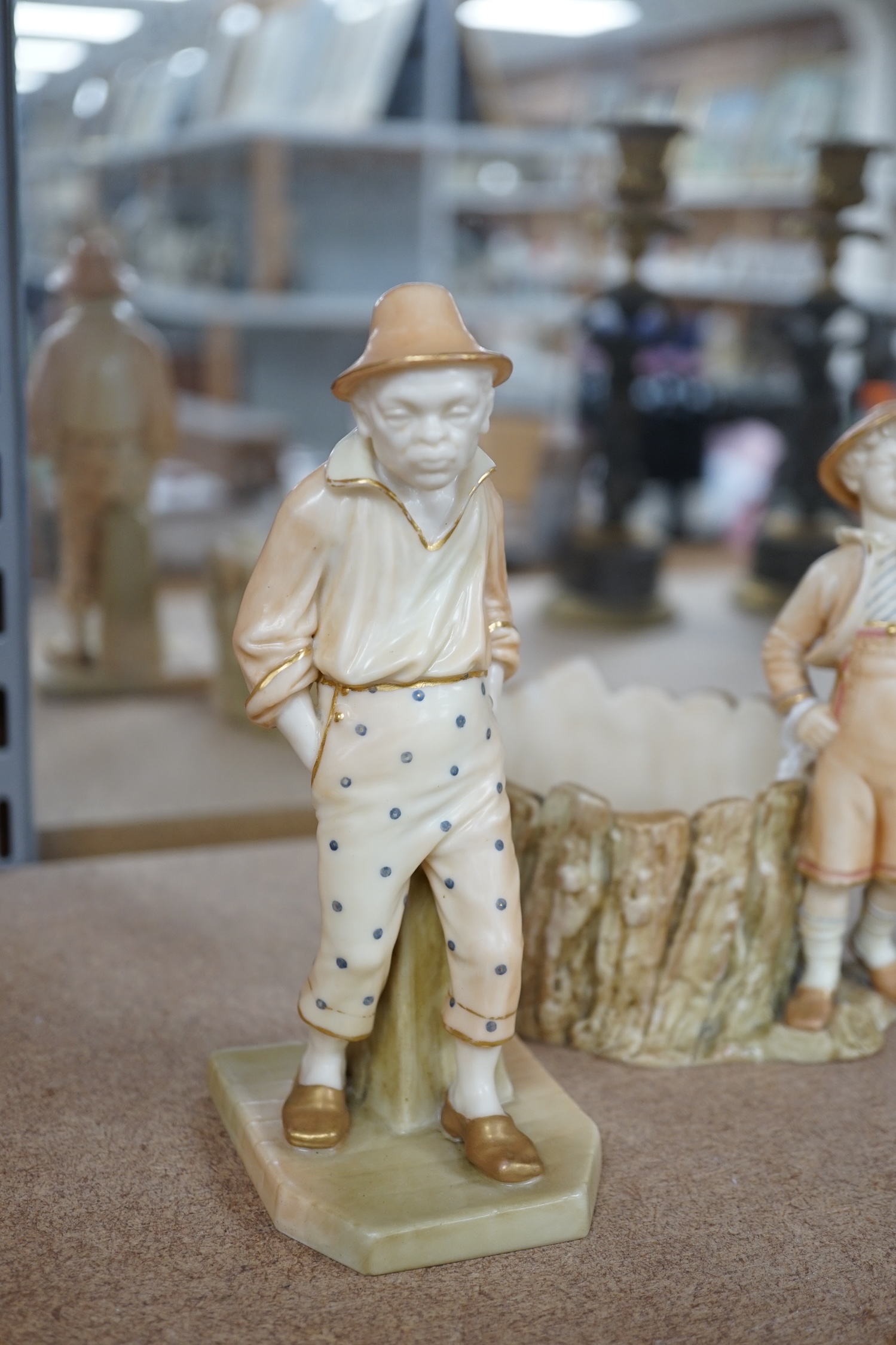 A Royal Worcester figure and a figural pot, model numbers 840 and 1242, tallest 17cm. Condition - pot cracked